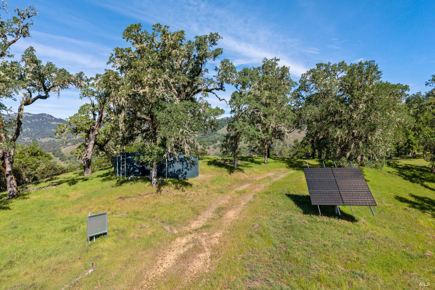 2800 Feliz Creek Road Hopland, CA 95449 - Photo 34 of 48 a backyard of a house with a yard and outdoor seating