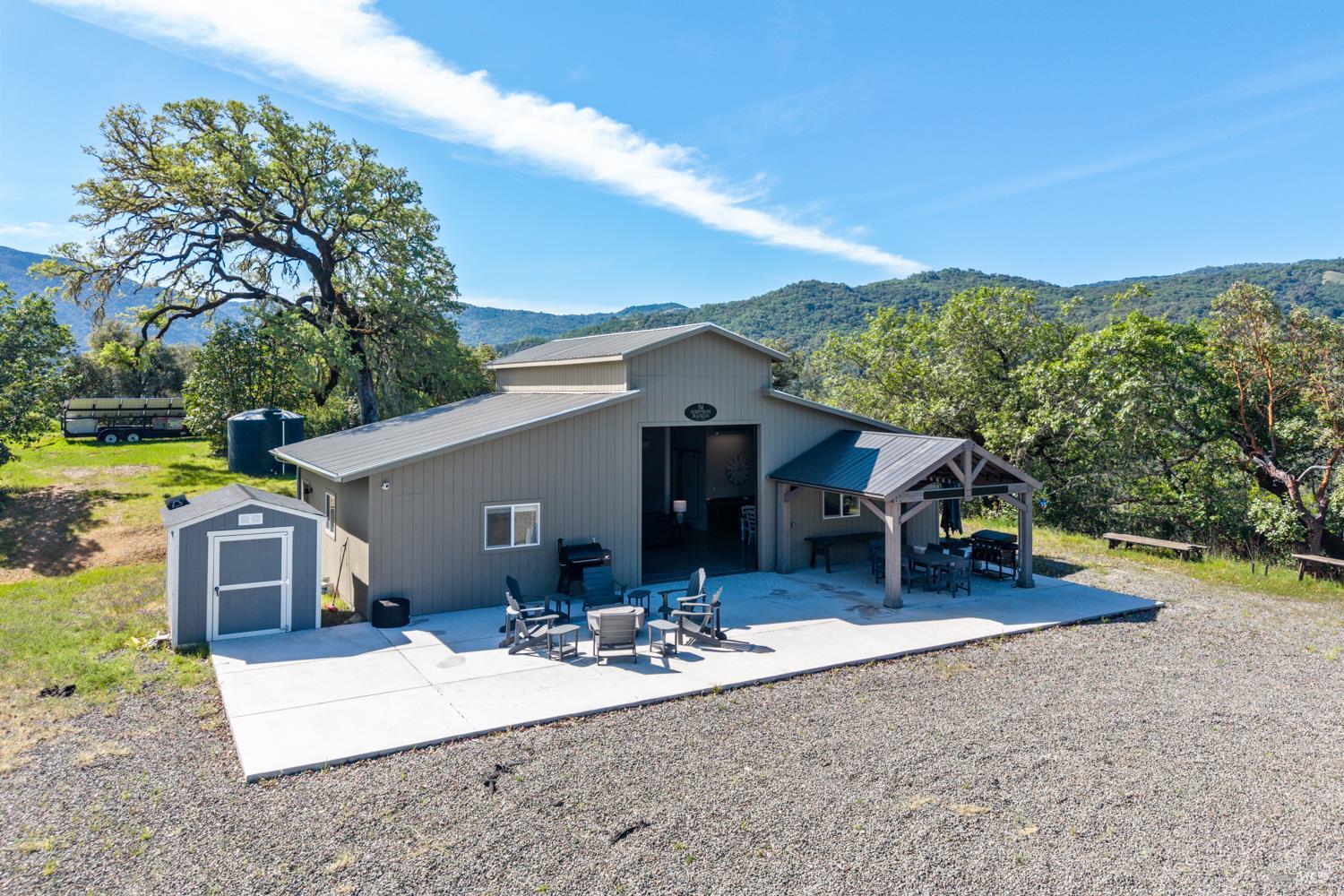 2800 Feliz Creek Road Hopland, CA 95449 - Photo 6 of 48 a view of a house with backyard patio and garden