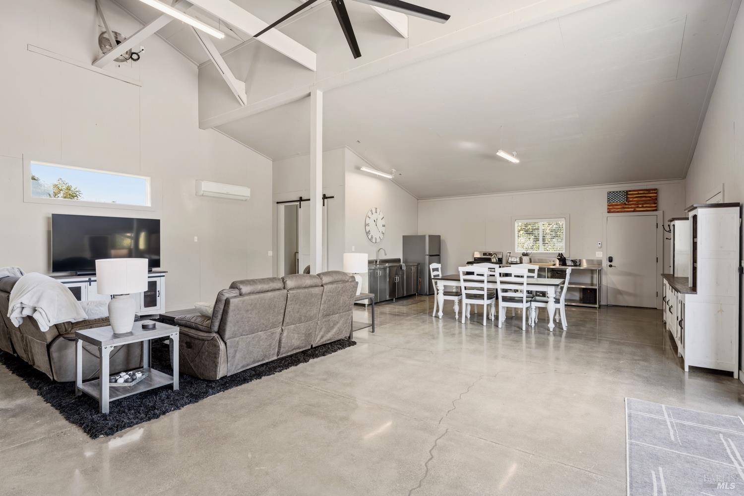 2800 Feliz Creek Road Hopland, CA 95449 - Photo 9 of 48 a living room with furniture and a flat screen tv
