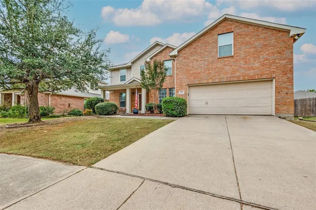 a front view of house with yard