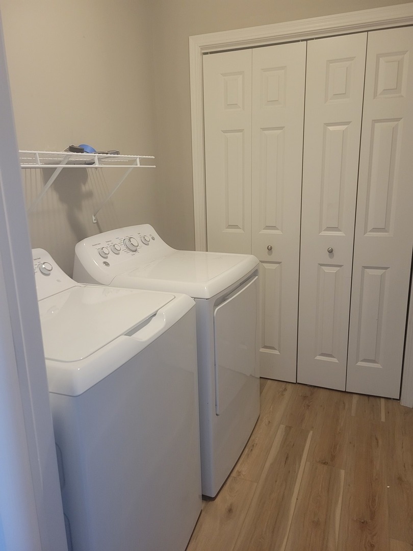 3704 Balcary Bay, Unit 3704 Champaign, IL 61822 - Photo 11 of 15 a utility room with dryer and washer