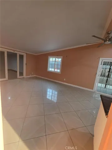 a view of entryway and hall with a large window