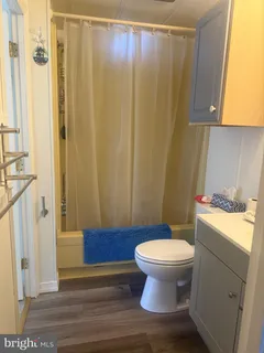 a bathroom with a glass door shower