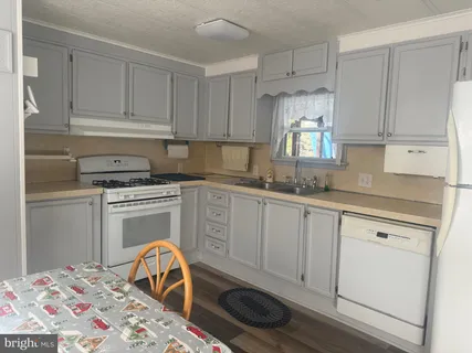 a bedroom with a bed and a table