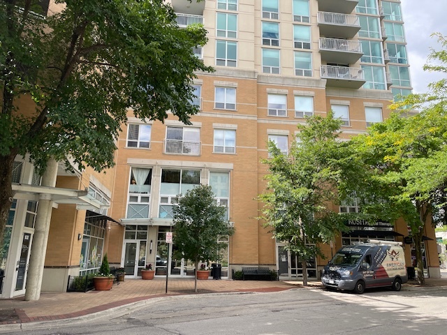 front view of a building with a street