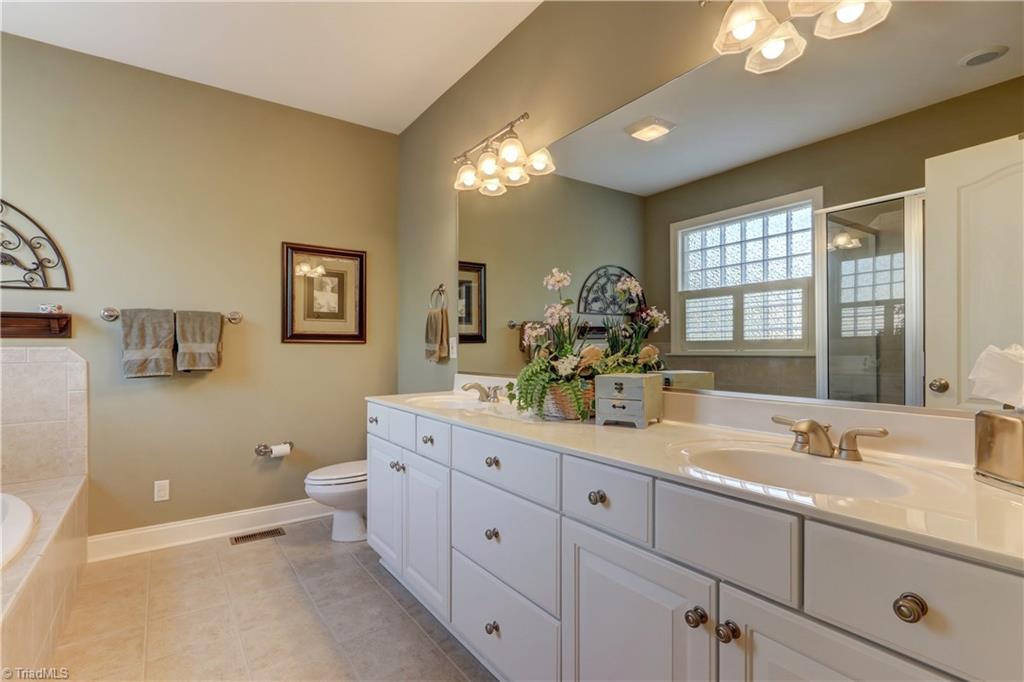 8909 Grove Park Drive Oak Ridge, NC 27310 - Photo 15 of 30