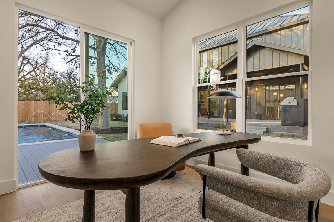 1301 Ruth Avenue Austin, TX 78757 - Photo 20 of 21 Dining space featuring wood finished floors and an office area