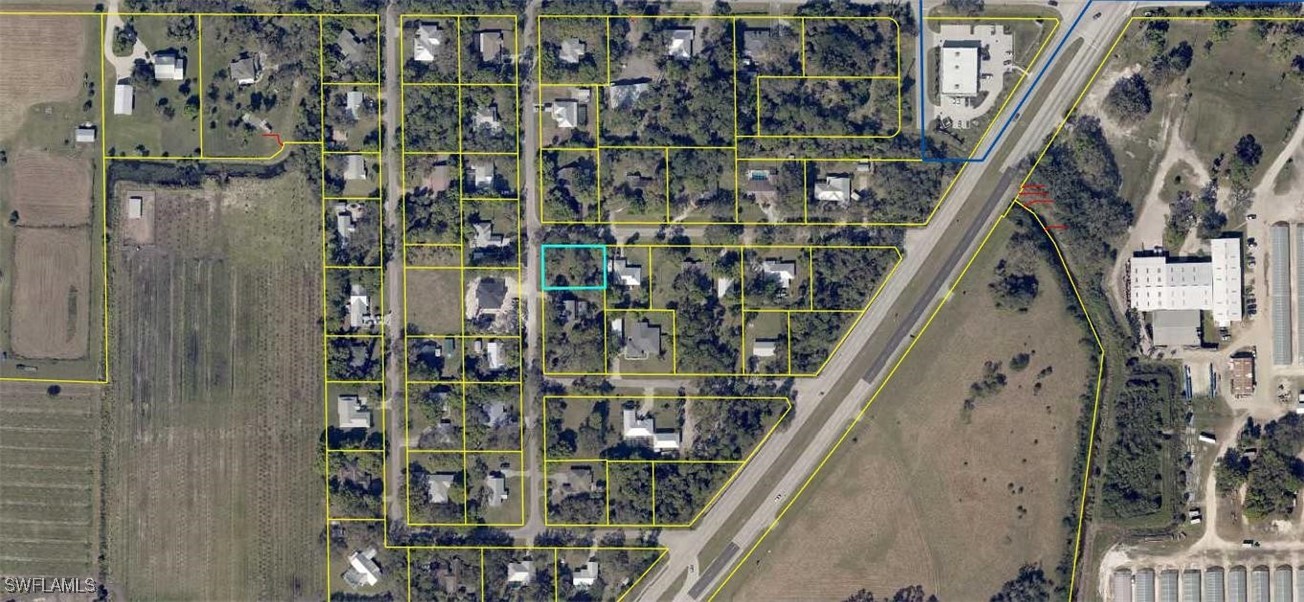 1111 Wood Drive LaBelle, FL 33935 - Photo 2 of 2 a close view of water heater room