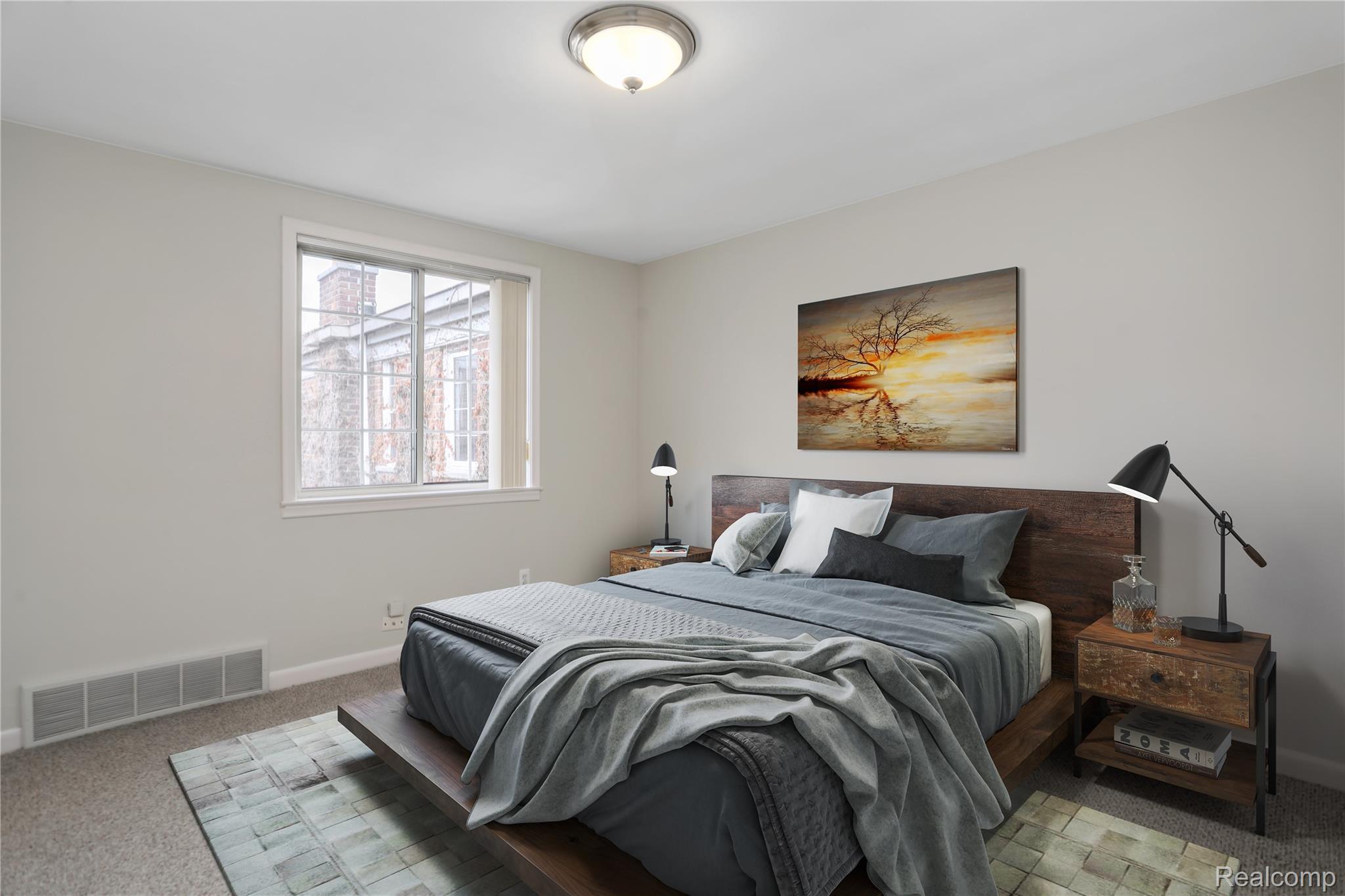 1898 Maple Road East Birmingham, MI 48009 - Photo 5 of 10 Spacious bedroom featuring light neutral walls, a large window, wall-to-wall carpeting, and a ceiling-mounted light fixture