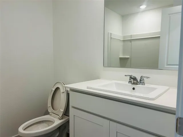 a view of a kitchen with a sink cabinets and a window