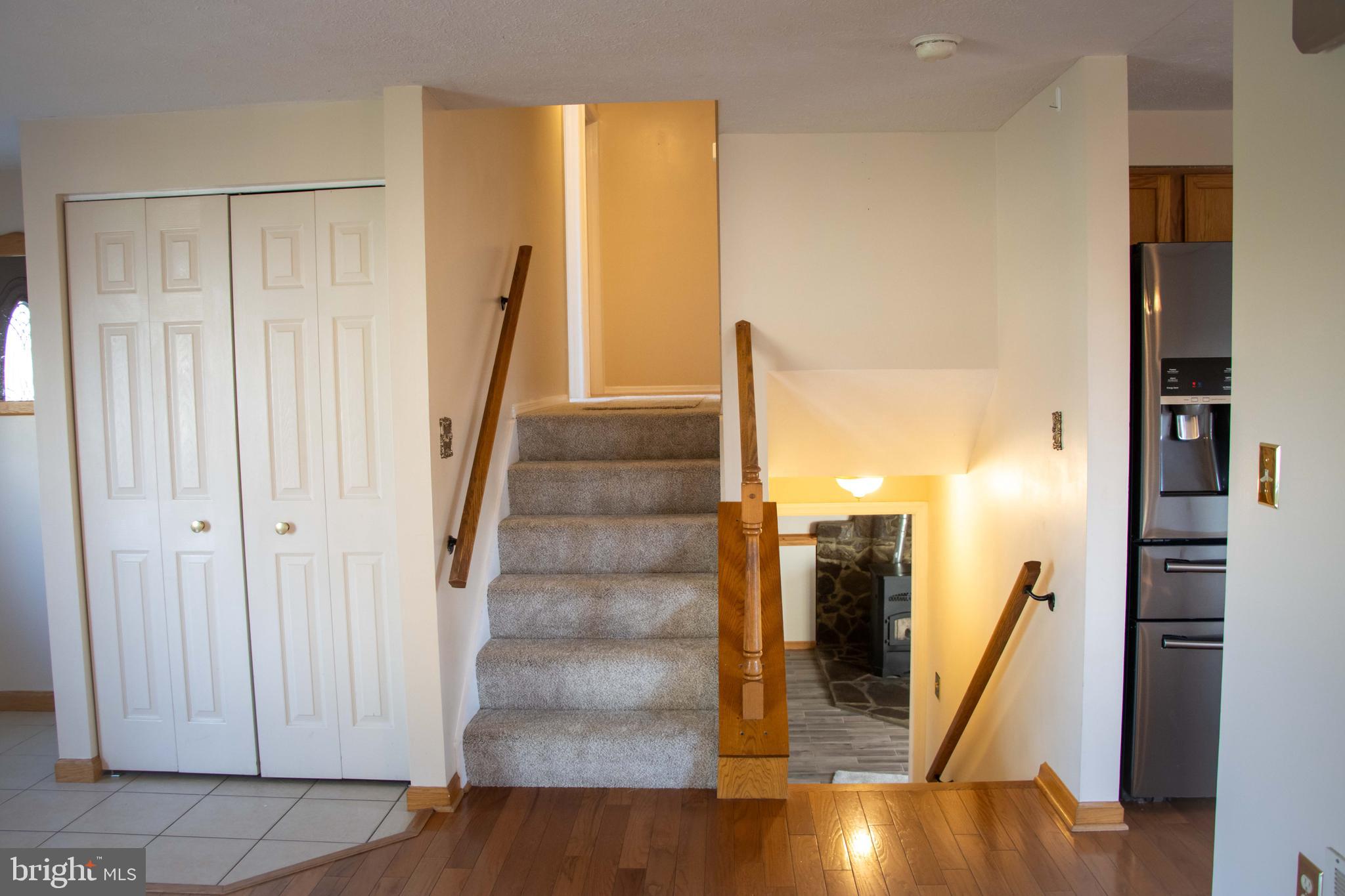 387 West Ridge Loop Road Romney, WV 26757 - Photo 17 of 58 Entry Level 1- View of stairs leading up and down