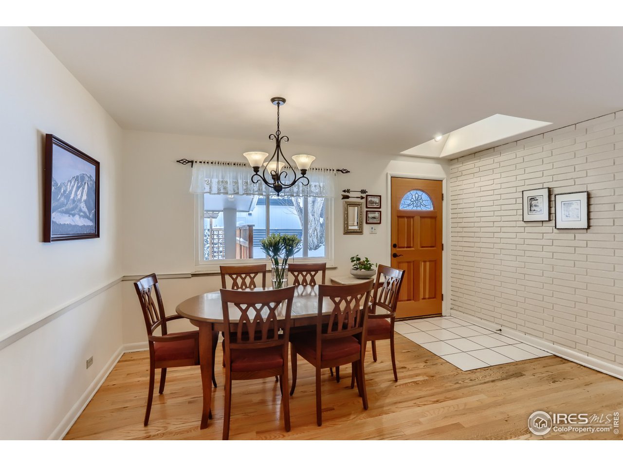 280 Echo Place Boulder, CO 80302 - Photo 13 of 40 a view of a dining room with furniture and chandelier