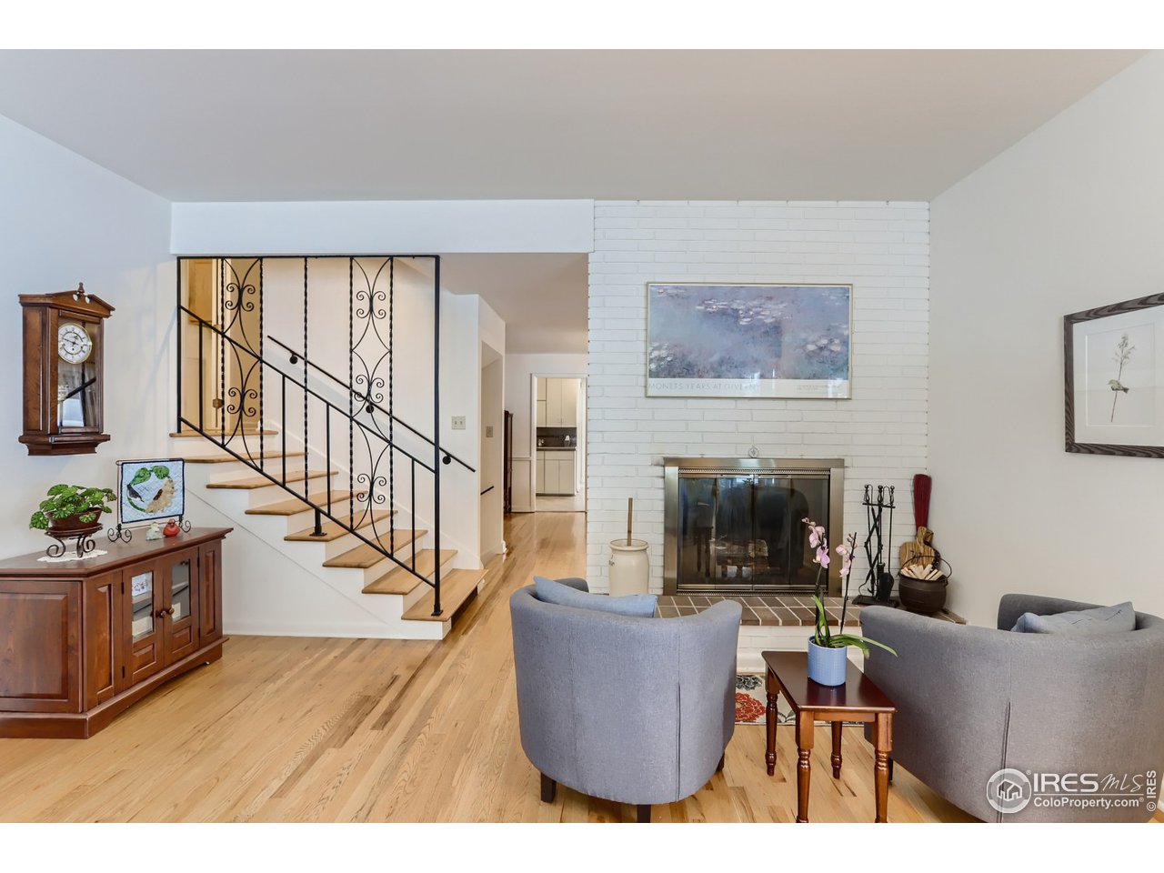 280 Echo Place Boulder, CO 80302 - Photo 16 of 40 a living room with furniture and a fireplace