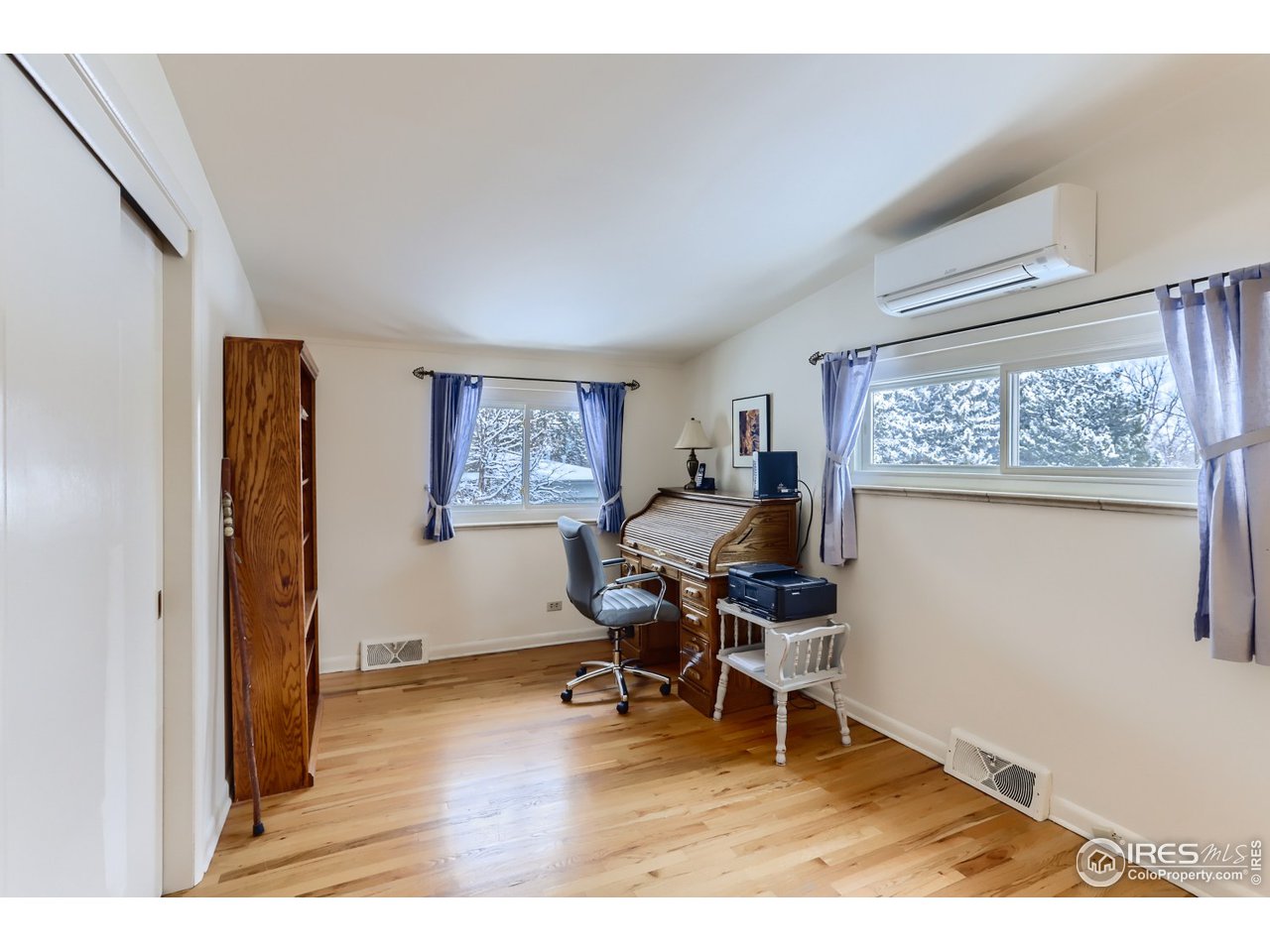 280 Echo Place Boulder, CO 80302 - Photo 26 of 40 a work room with wooden floor and a window