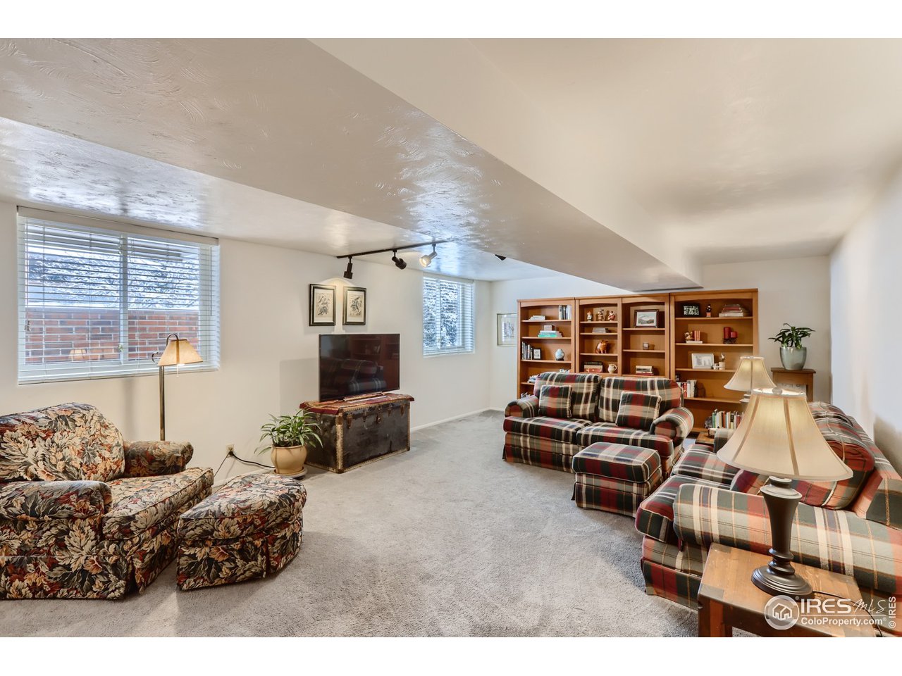 280 Echo Place Boulder, CO 80302 - Photo 29 of 40 a bedroom with furniture and a large window
