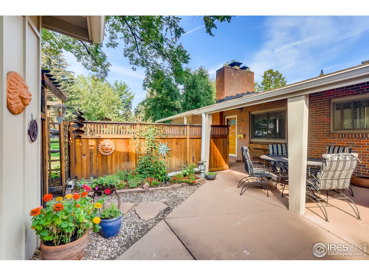 280 Echo Place Boulder, CO 80302 - Photo 30 of 40 a view of a porch with furniture and a potted plant