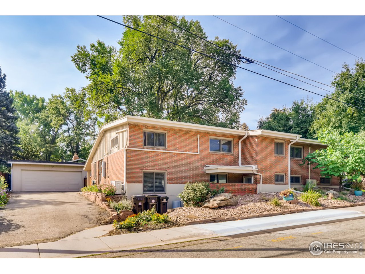 280 Echo Place Boulder, CO 80302 - Photo 34 of 40 front view of a house with a small yard
