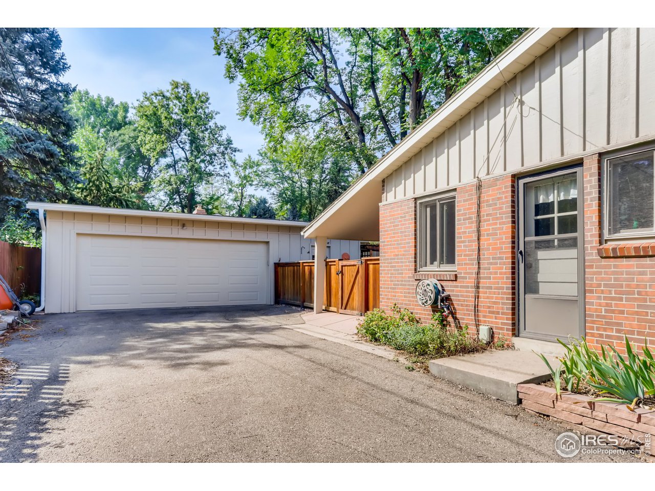 280 Echo Place Boulder, CO 80302 - Photo 35 of 40 a view of a house with a yard