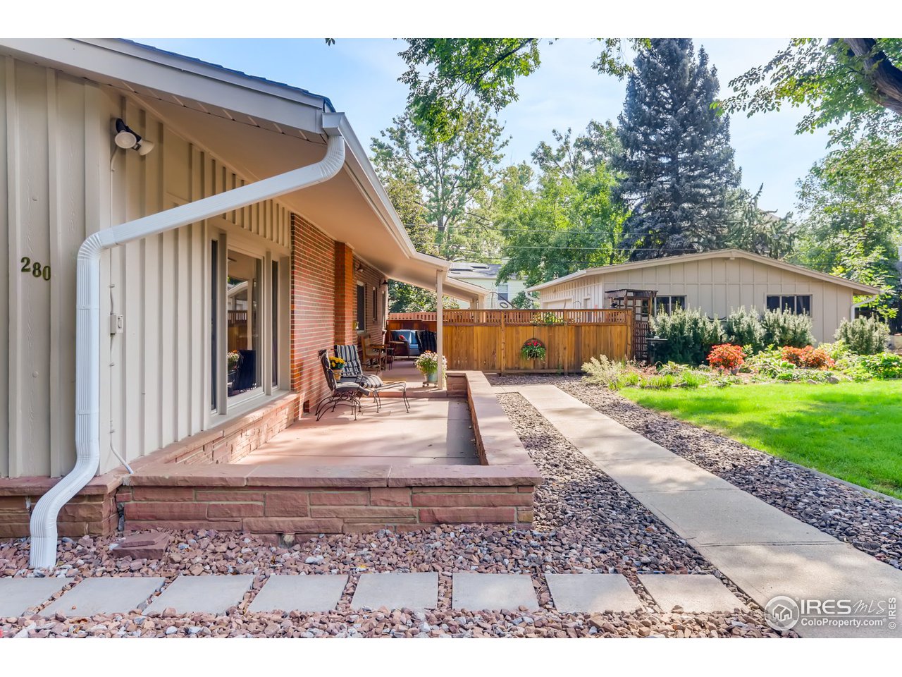 280 Echo Place Boulder, CO 80302 - Photo 4 of 40 a view of a house with a yard