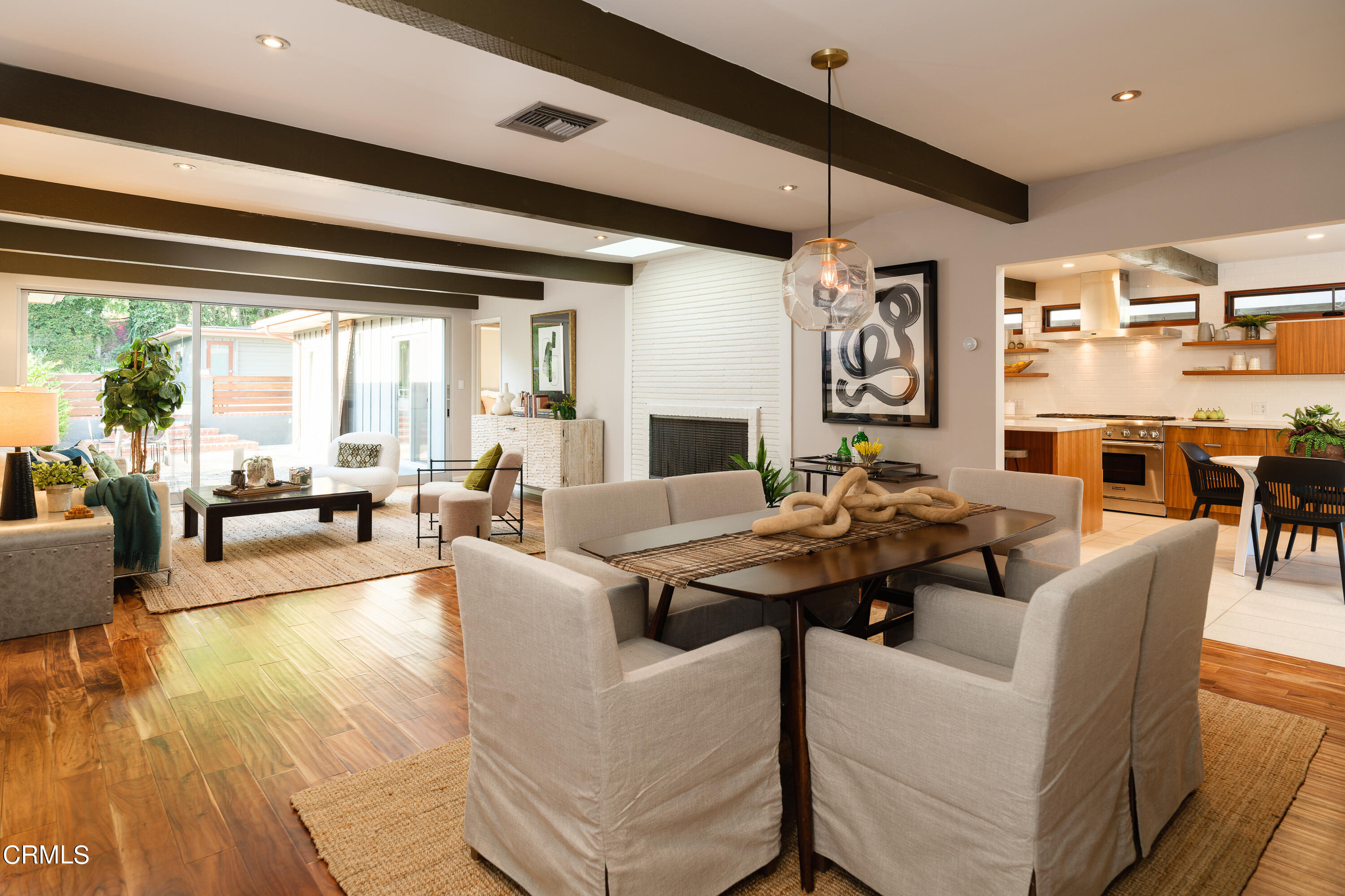1025 Nithsdale Road Pasadena, CA 91105 - Photo 13 of 73 a living room with fireplace furniture and a large window
