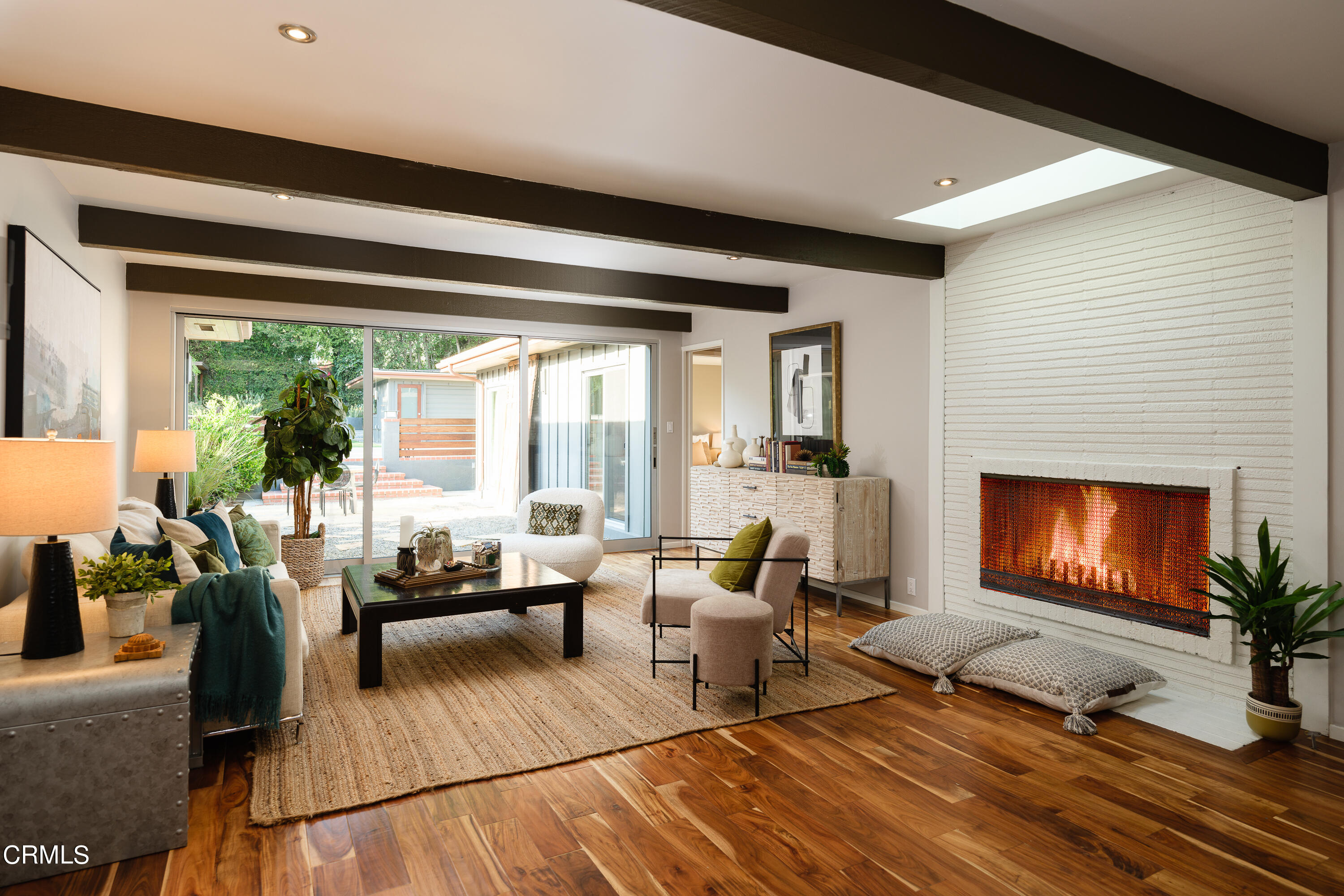 1025 Nithsdale Road Pasadena, CA 91105 - Photo 14 of 73 a living room with furniture and a fireplace