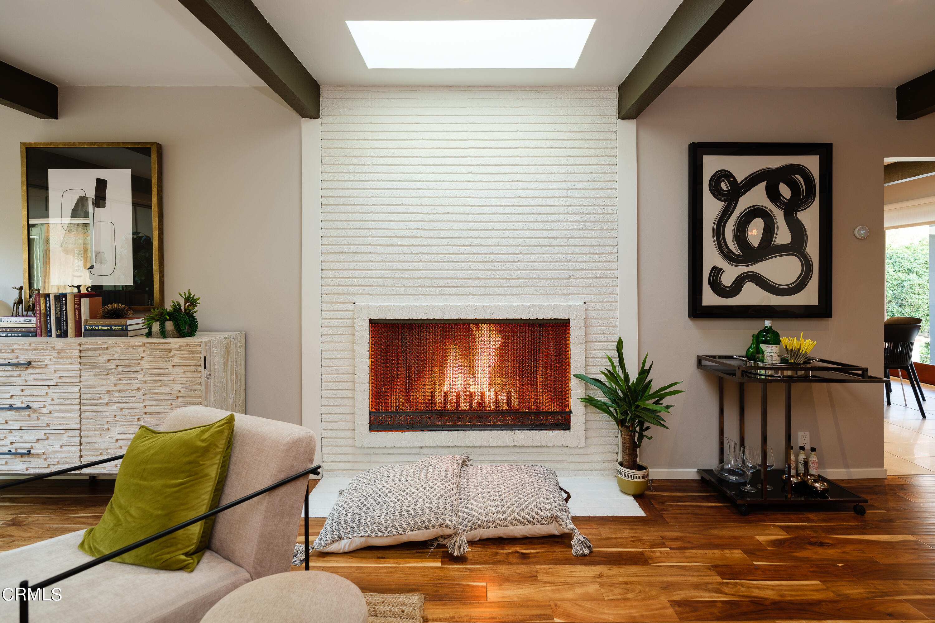 1025 Nithsdale Road Pasadena, CA 91105 - Photo 15 of 73 a living room with furniture and a fireplace