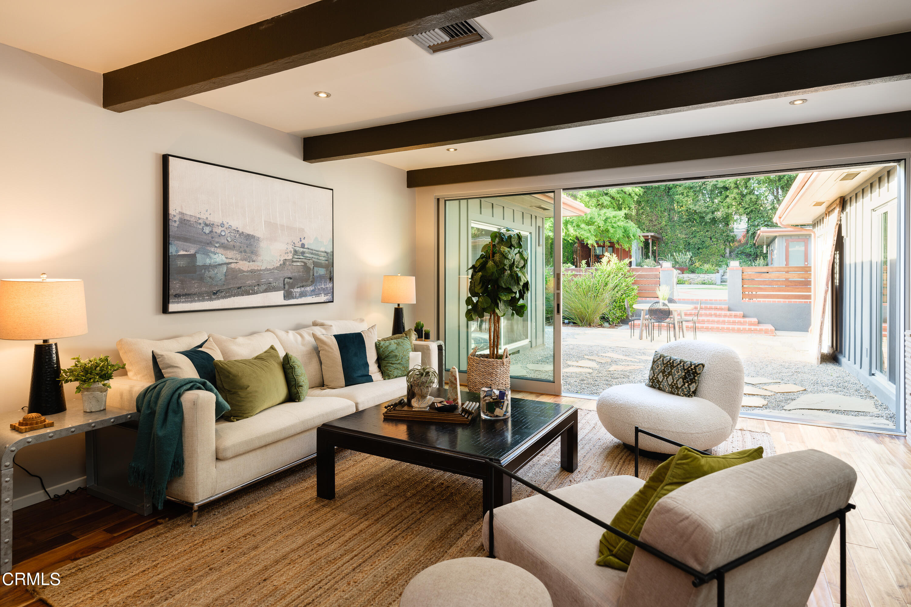 1025 Nithsdale Road Pasadena, CA 91105 - Photo 19 of 73 a living room with furniture and a large window