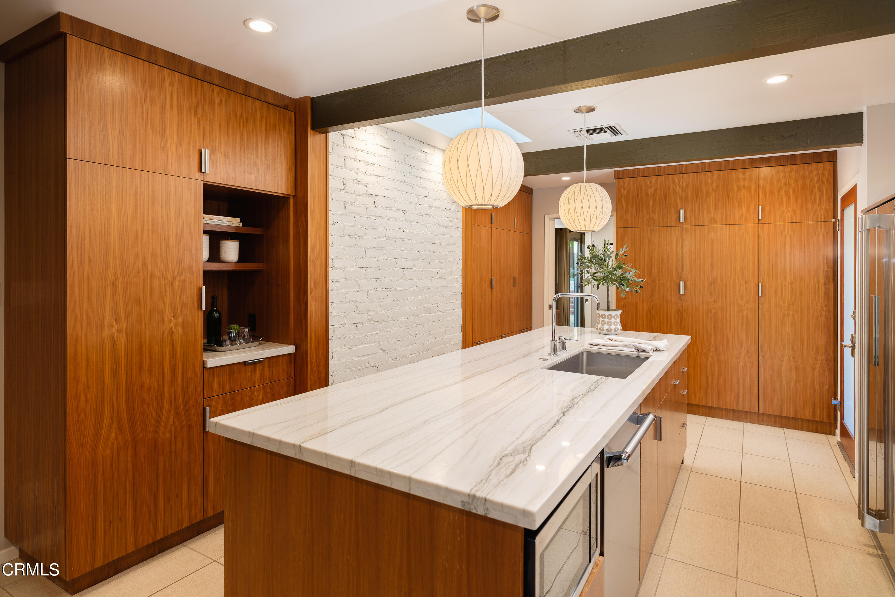 1025 Nithsdale Road Pasadena, CA 91105 - Photo 25 of 73 a kitchen with a sink a refrigerator and a stove