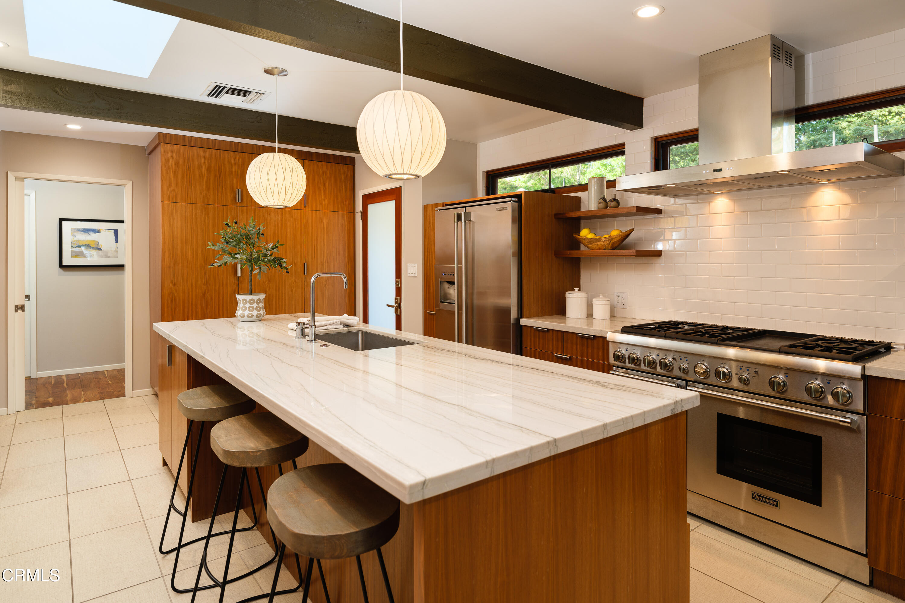 1025 Nithsdale Road Pasadena, CA 91105 - Photo 26 of 73 a kitchen with a stove and a table