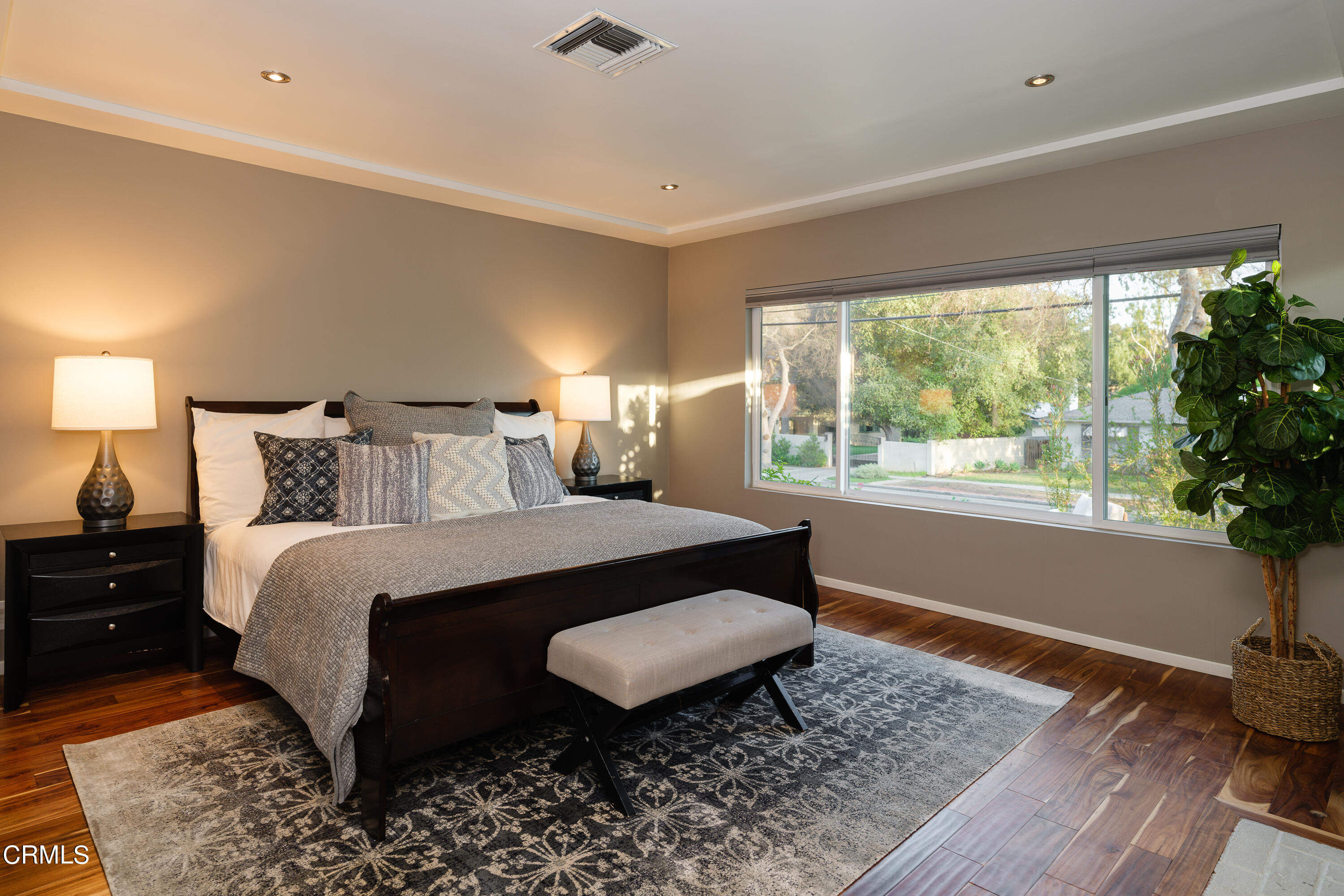 1025 Nithsdale Road Pasadena, CA 91105 - Photo 31 of 73 a bed sitting in a bedroom next to a window