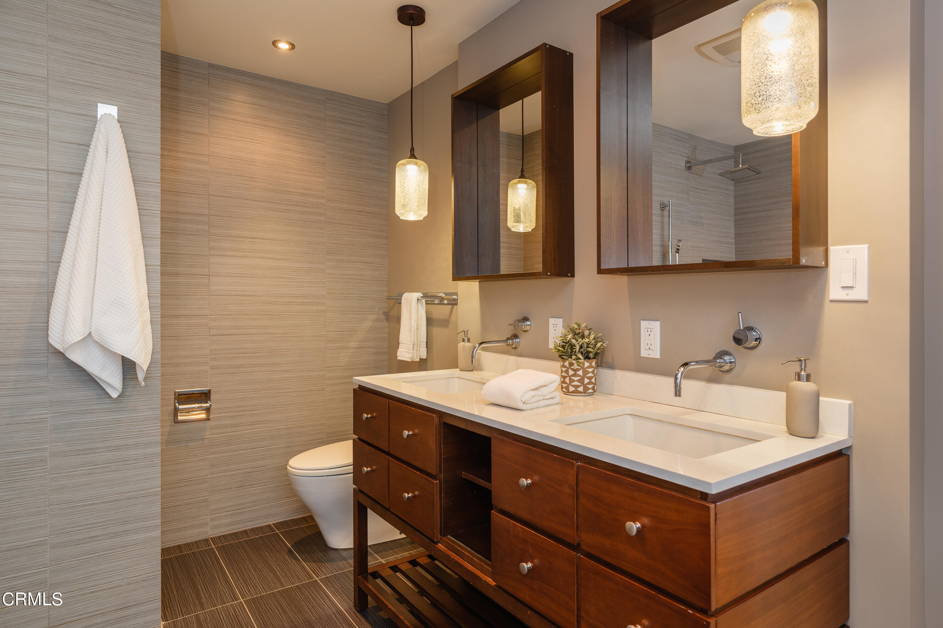 1025 Nithsdale Road Pasadena, CA 91105 - Photo 34 of 73 a bathroom with a sink and a mirror