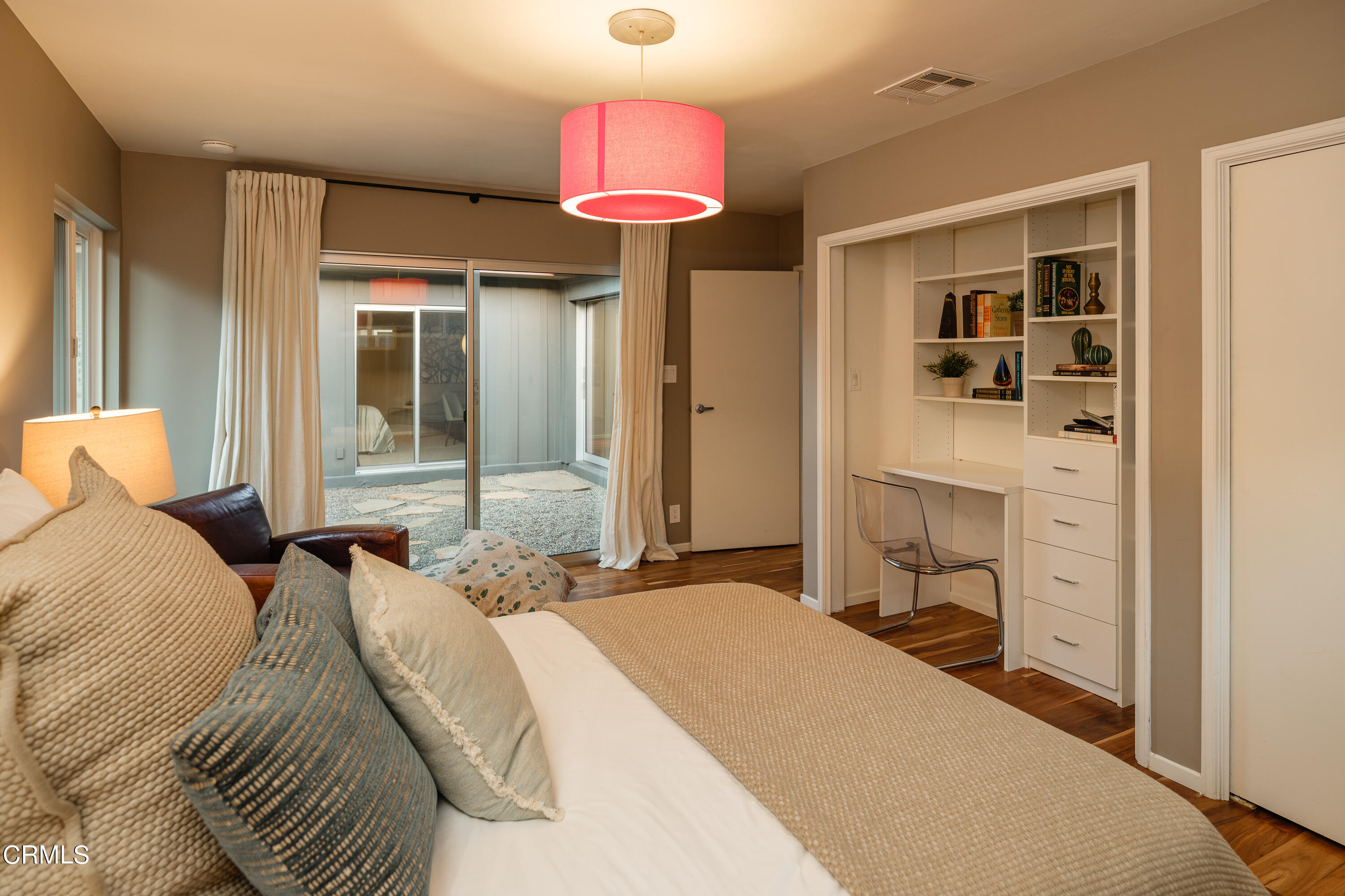 1025 Nithsdale Road Pasadena, CA 91105 - Photo 39 of 73 a bedroom with a bed and a chandelier