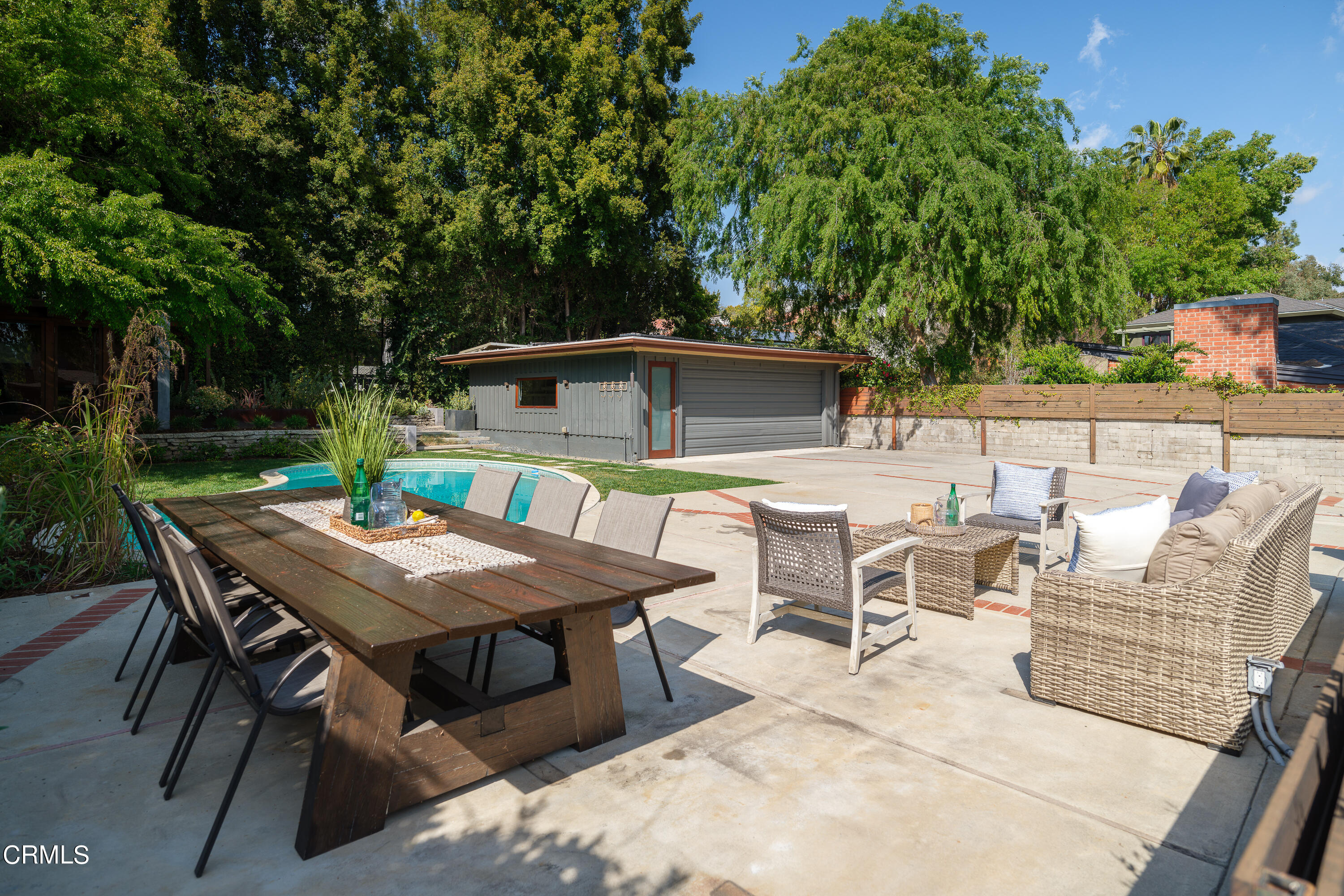 1025 Nithsdale Road Pasadena, CA 91105 - Photo 50 of 73 a view of a dinning table and chairs in the patio
