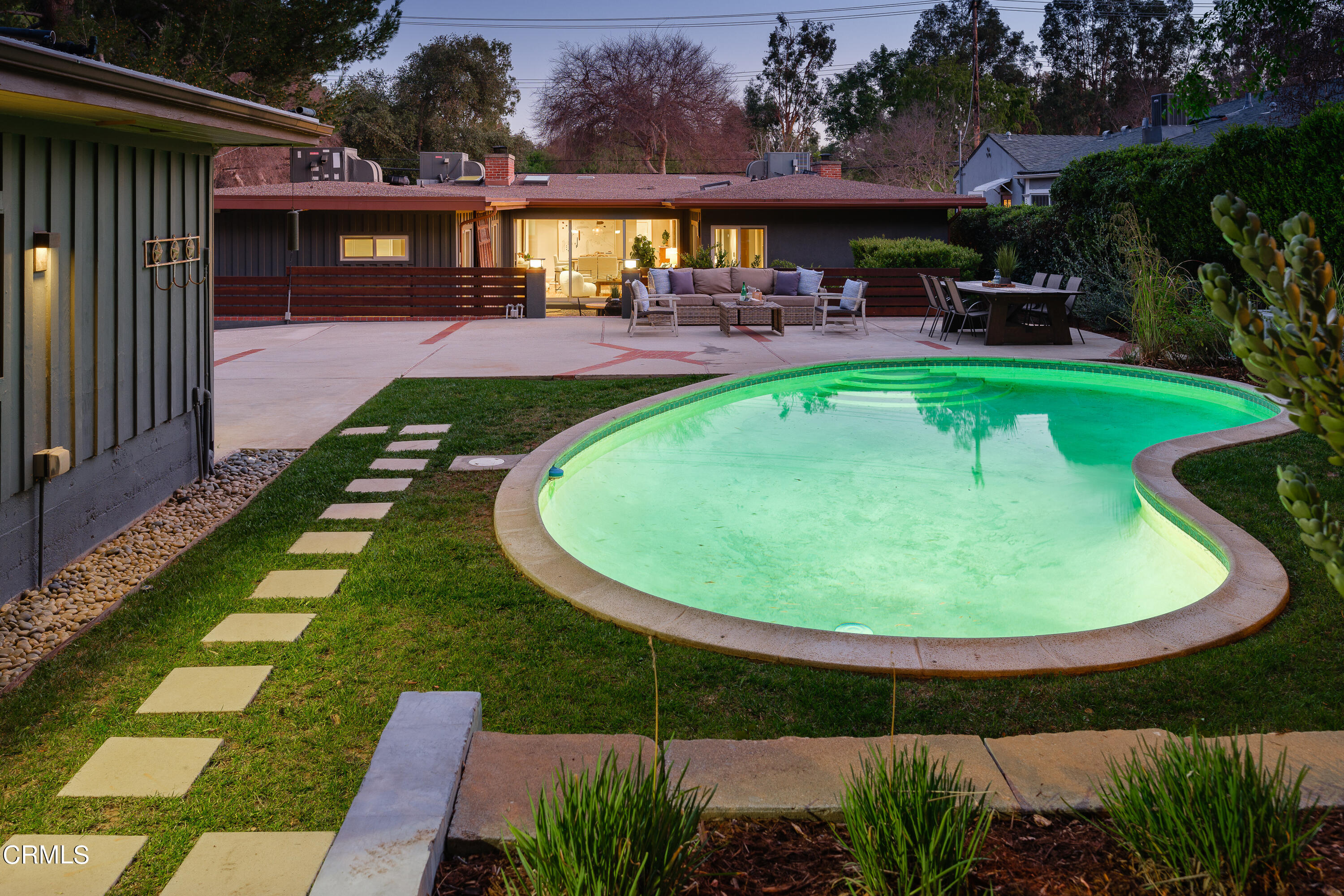 1025 Nithsdale Road Pasadena, CA 91105 - Photo 69 of 73 a view of a swimming pool with a patio