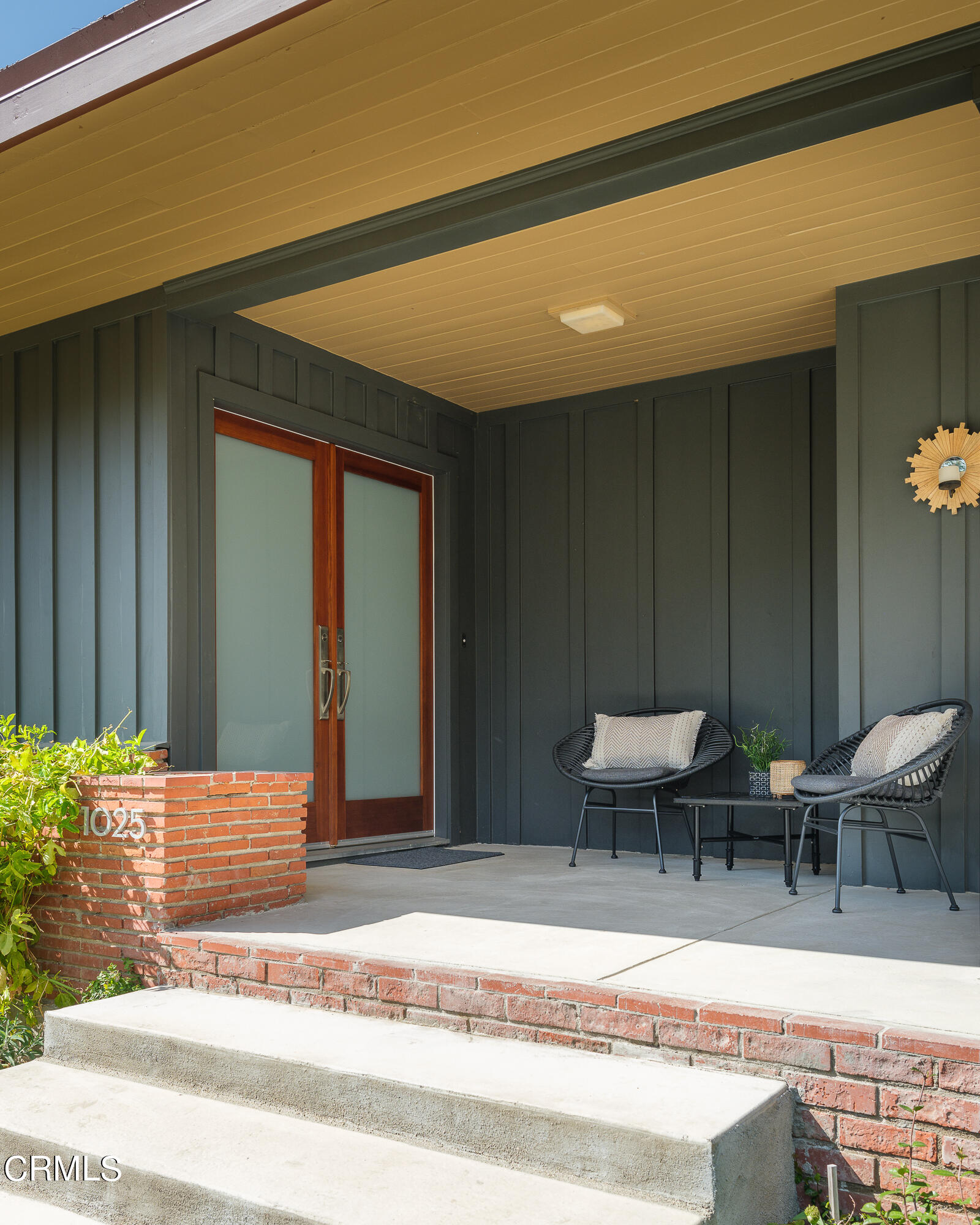 1025 Nithsdale Road Pasadena, CA 91105 - Photo 8 of 73 a view of a patio with table and chairs and potted plants
