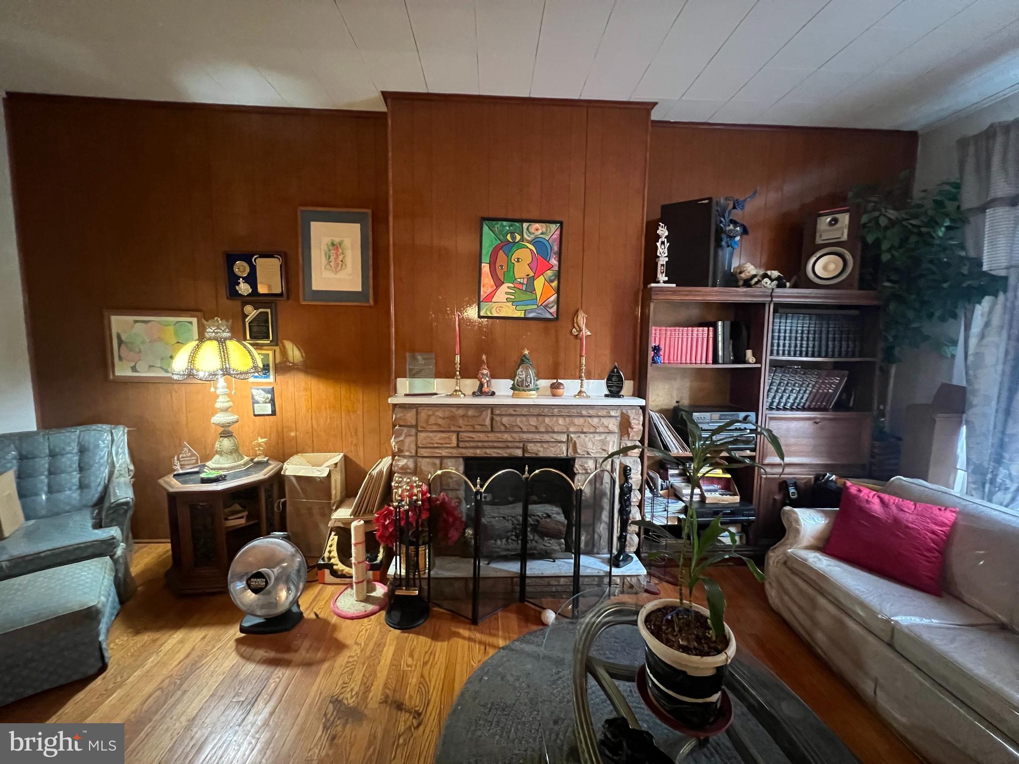 2441 Carpenter Street Philadelphia, PA 19146 - Photo 7 of 34 a living room with furniture and a fireplace