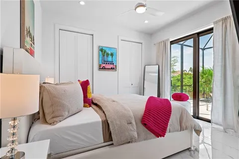 a bed room with a bed and a couch