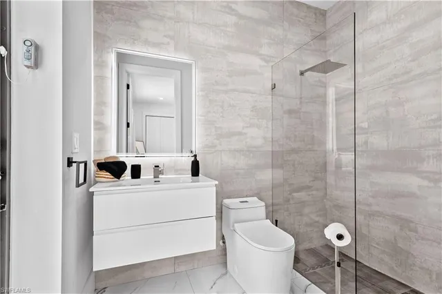 a swimming pool with outdoor seating and yard