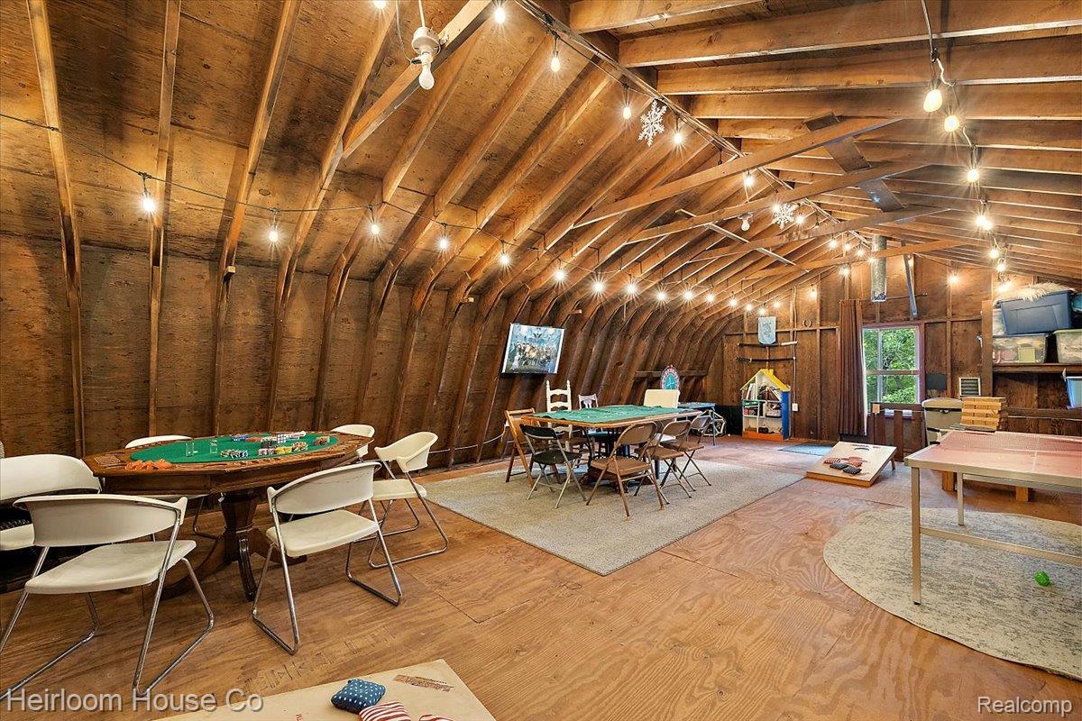 49001 Hanford Road Canton, MI 48187 - Photo 93 of 98 Spacious bonus room featuring exposed wood beam ceilings and wood-finish flooring