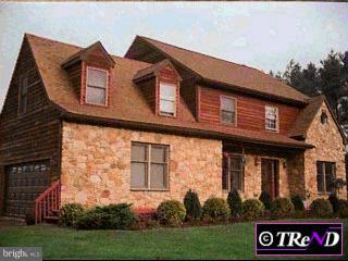 4 East Peace Valley Road Chalfont, PA 18914 - Photo 1 of 1 a front view of a house with garden