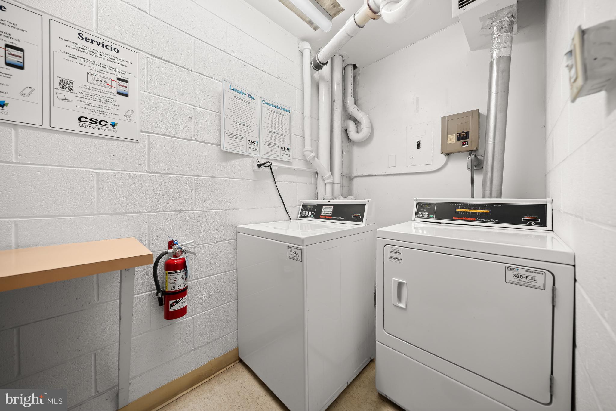 1260 21st Street Northwest, Unit 107 Washington, DC 20036 - Photo 15 of 21 a utility room with dryer and washer