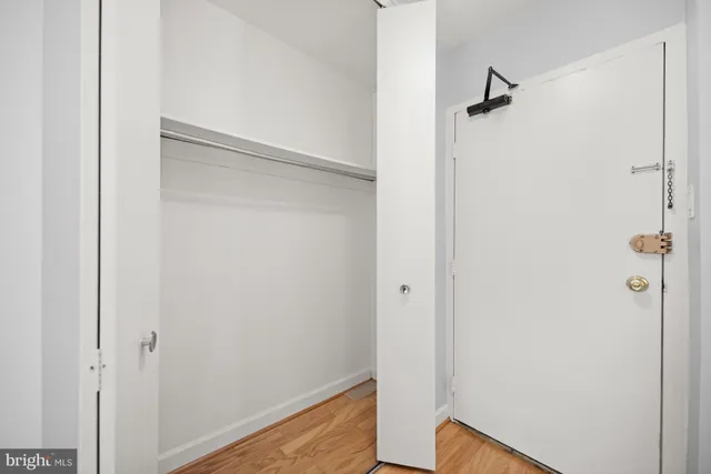 a kitchen with stainless steel appliances a refrigerator sink and microwave