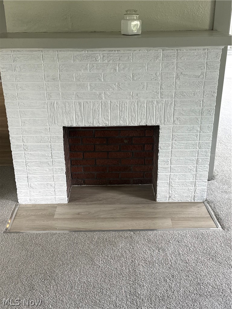 182 Elm Street Struthers, OH 44471 - Photo 6 of 18 LIVING ROOM FIREPLACE