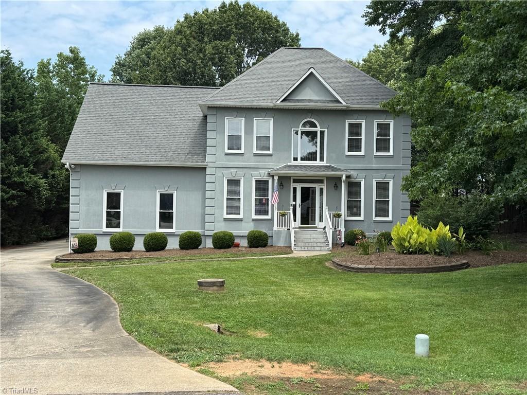 2817 Norwell Court Oak Ridge, NC 27310 - Photo 1 of 35 Front of house from the cul-de-sac