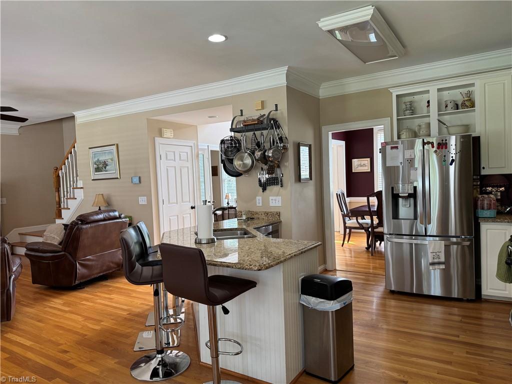 2817 Norwell Court Oak Ridge, NC 27310 - Photo 14 of 35 Breakfast bar with stools.