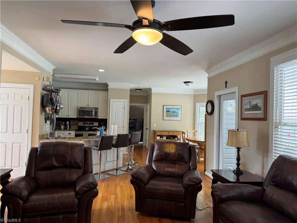 2817 Norwell Court Oak Ridge, NC 27310 - Photo 19 of 35 View from the den all the way to the laundry