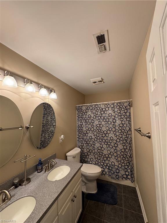 2817 Norwell Court Oak Ridge, NC 27310 - Photo 20 of 35 Upstairs hallway bath
