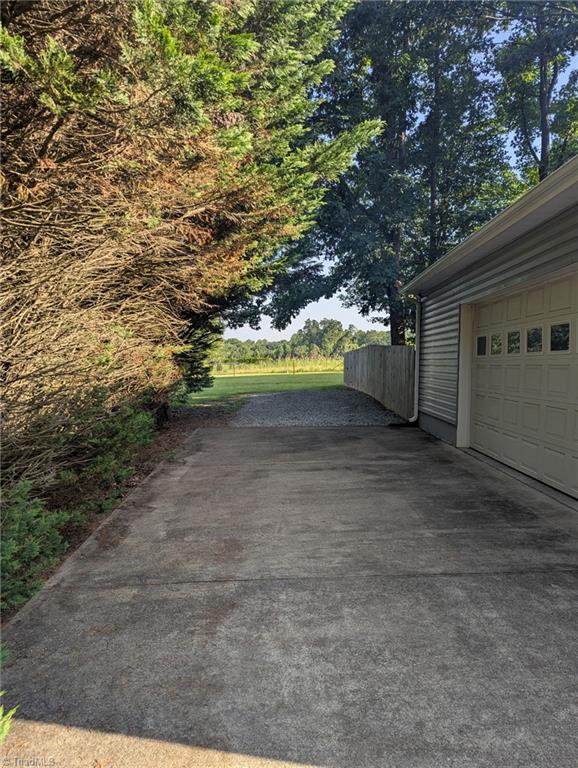 2817 Norwell Court Oak Ridge, NC 27310 - Photo 3 of 35 Extra long driveway