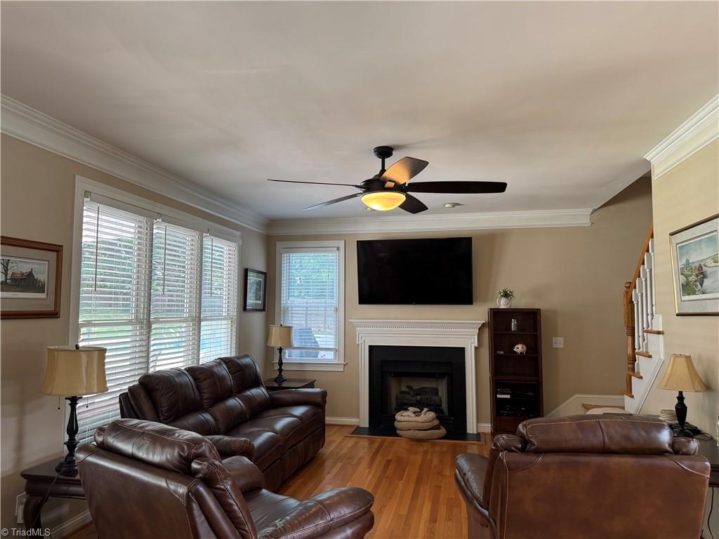 2817 Norwell Court Oak Ridge, NC 27310 - Photo 10 of 35 Television above fire place stays