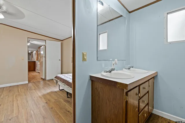 a view of a kitchen from the hallway